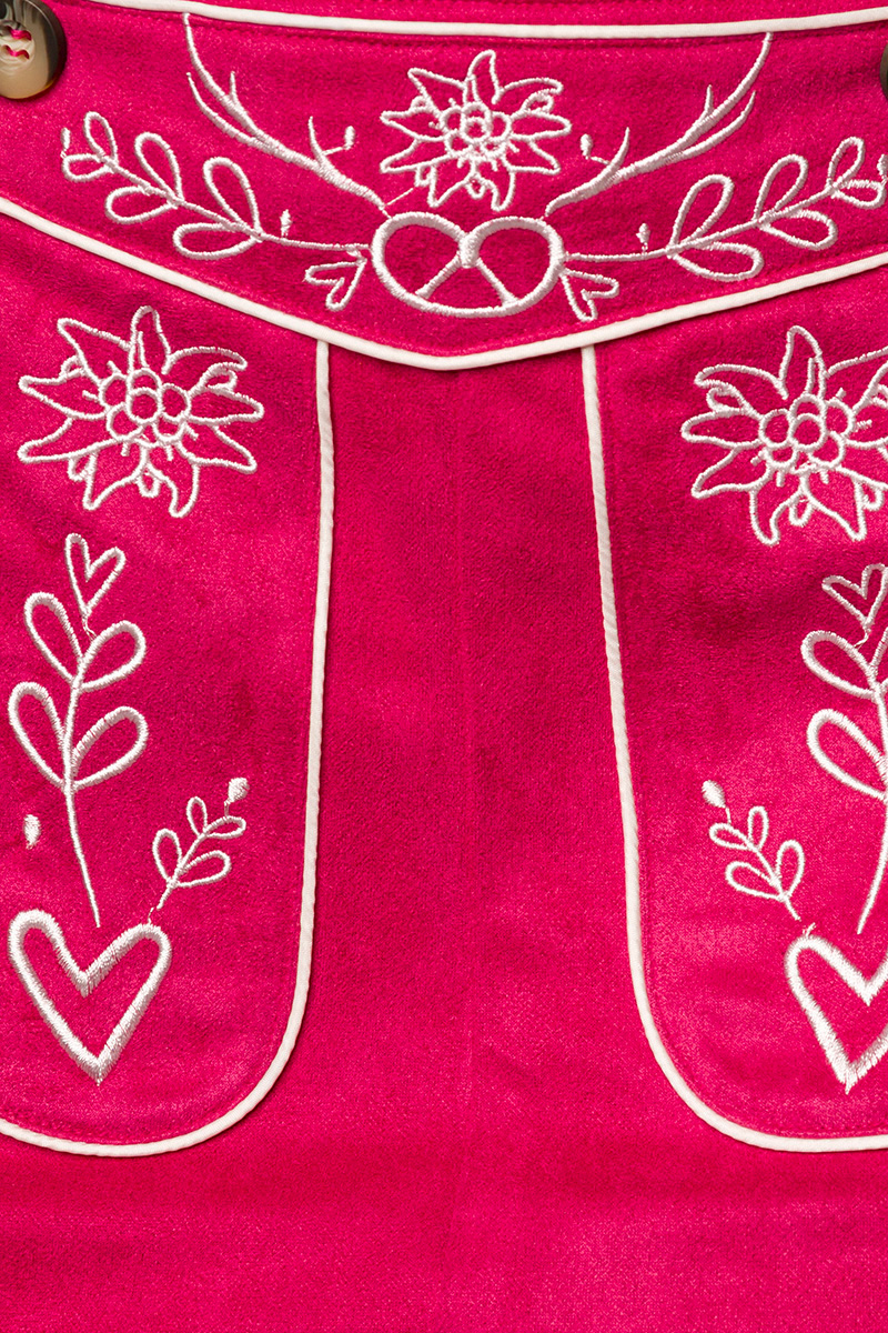 Traditionele lederhosen vrouw met borduurwerk roze